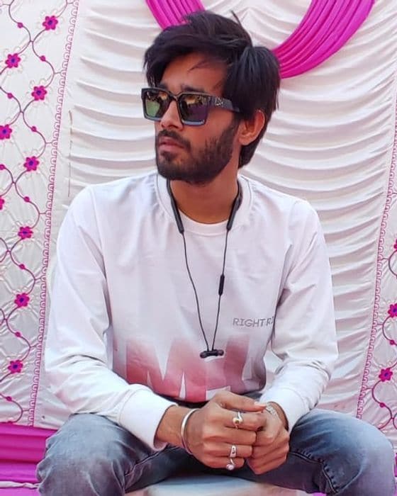 Portrait of Tejas Parmar wearing sunglasses