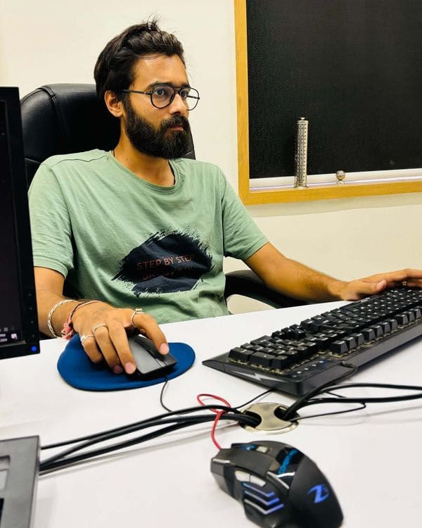 Tejas Parmar at work in the Digital Confident office, Rajkot